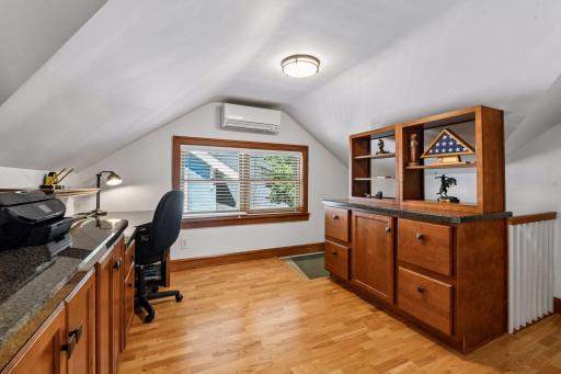 Home office with beautiful built-in desk and storage areas