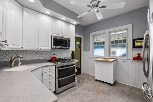 Stainless steel appliances with double ovens and a gas cooktop