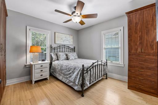 Spacious main floor primary bedroom with California Closet built-ins