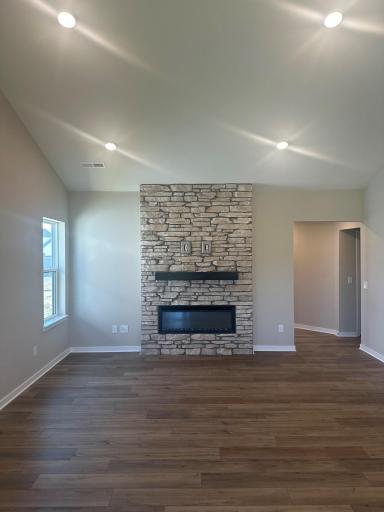 Gathering Room with Stone Fireplace 8828 63rd.jpg