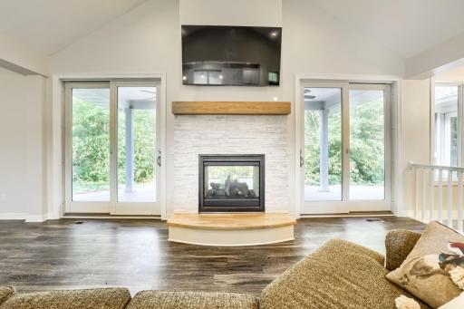 Double sided Gas Fireplace opens to Back Patio