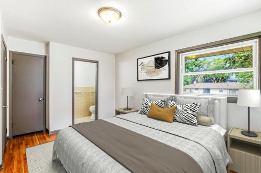 Primary Bedroom with en suite bathroom [image digitally staged]