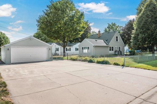 Oversized two car garage with a large concrete diveway