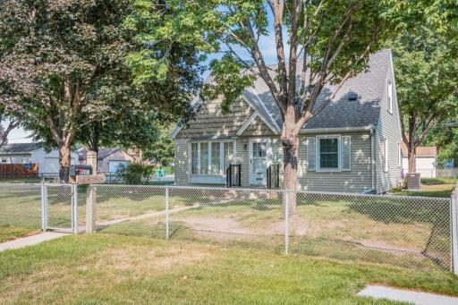 Steel siding, fenced yard & a great corner lot!