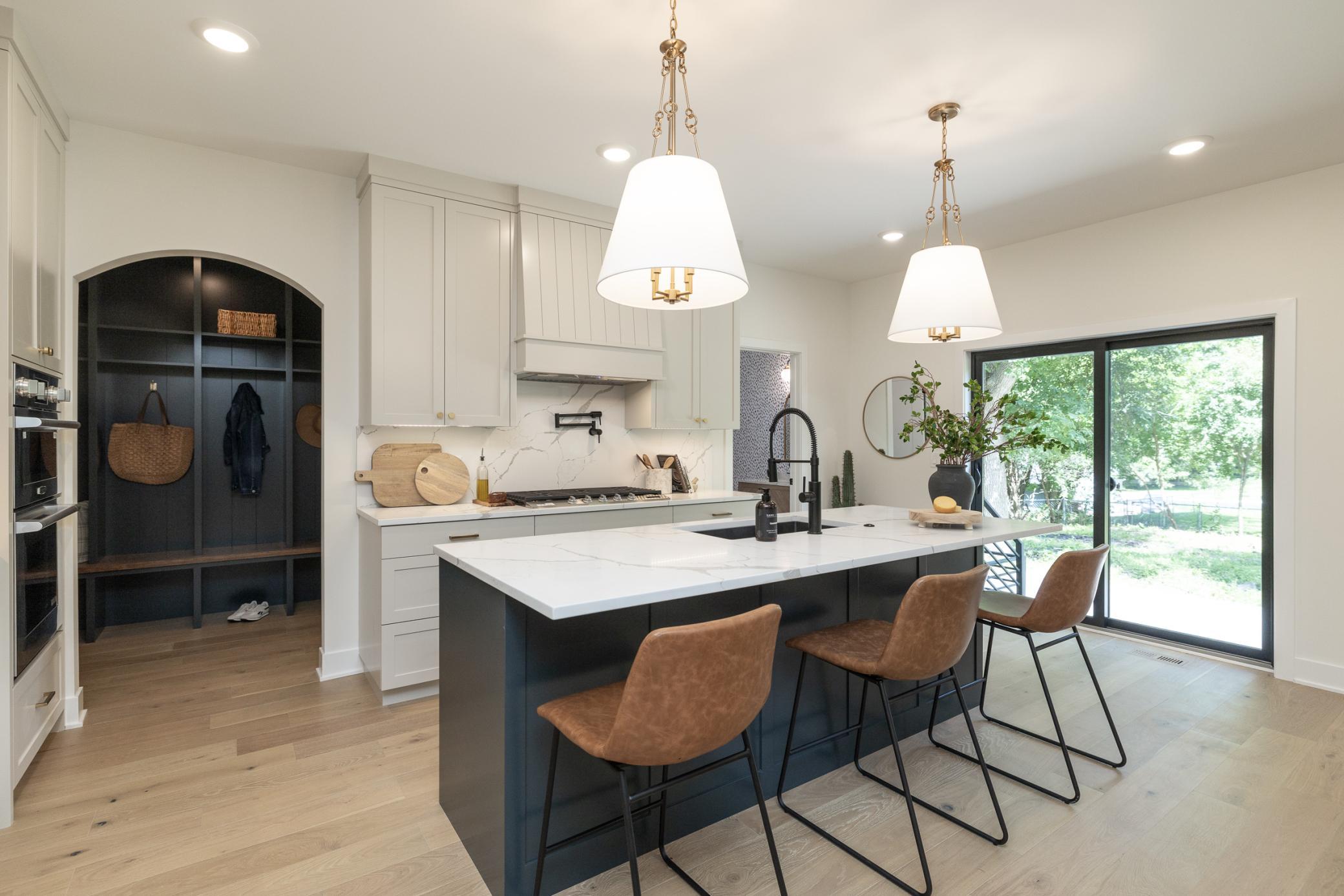 Kitchen area with patio door to backyard