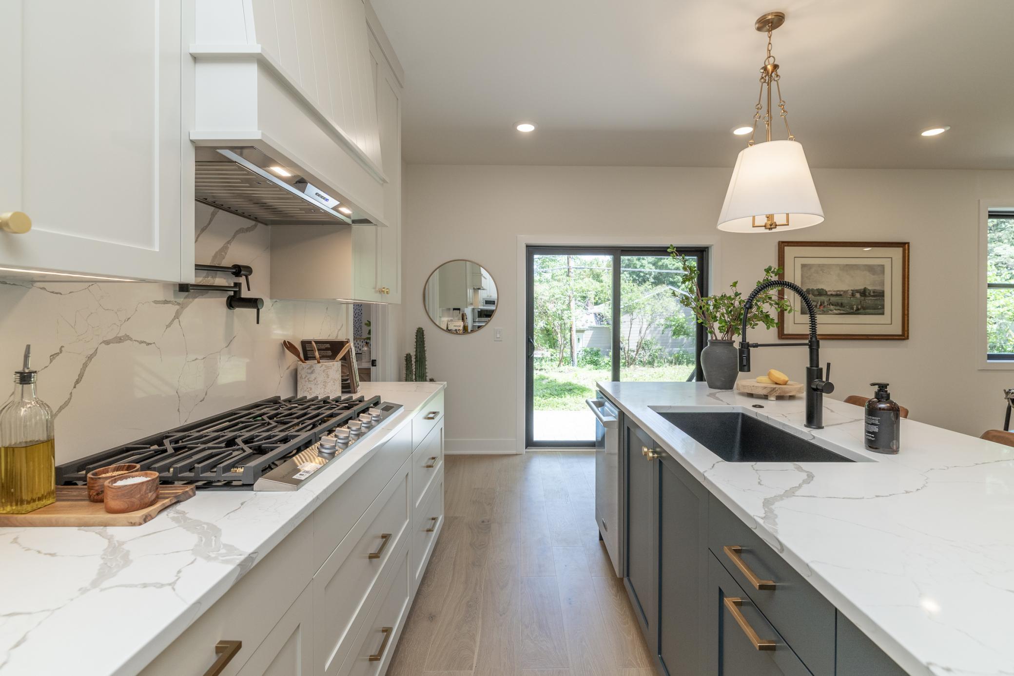 36" gas cooktop with folding pot filler faucet