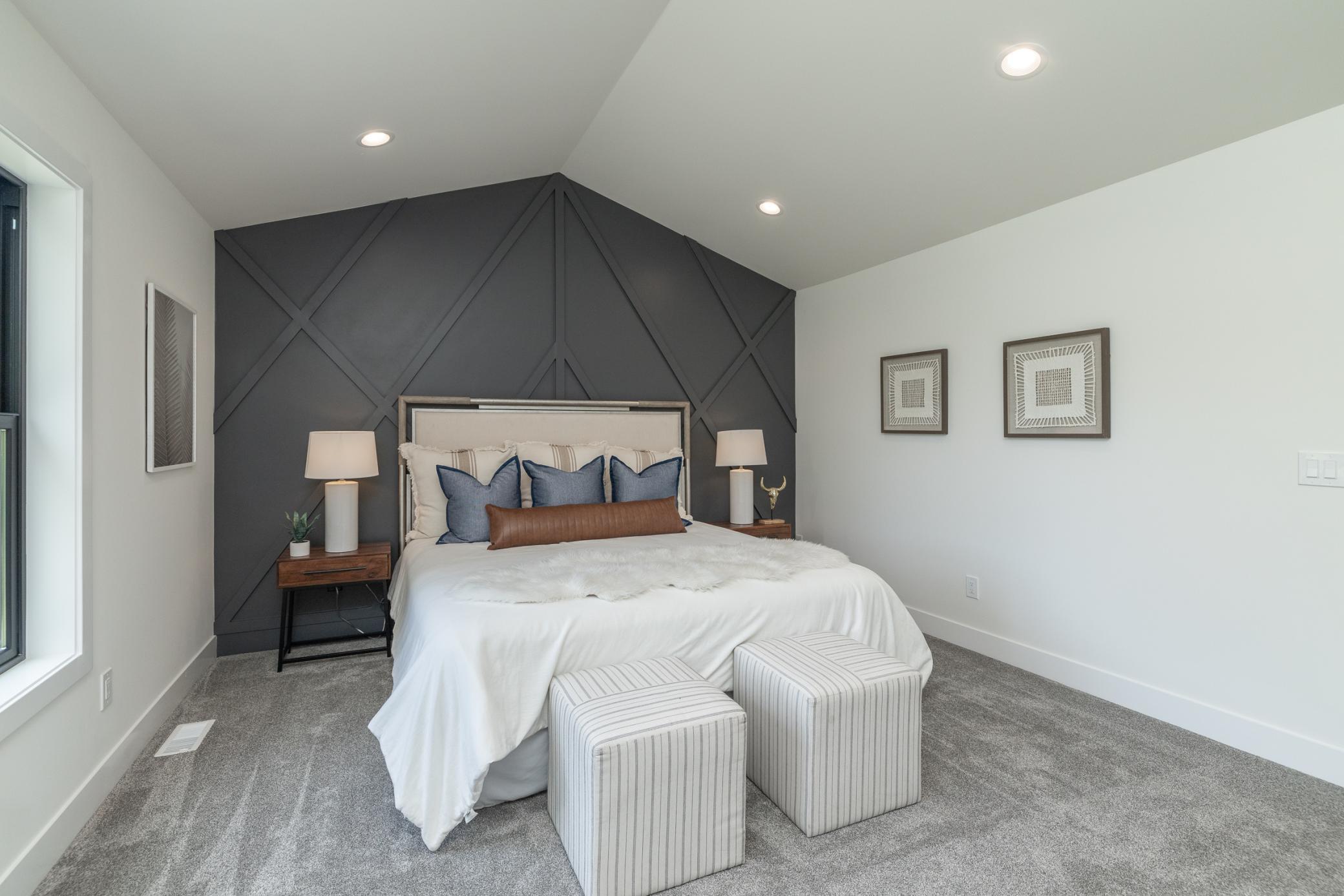 Vaulted ceilings and custom wood accent wall