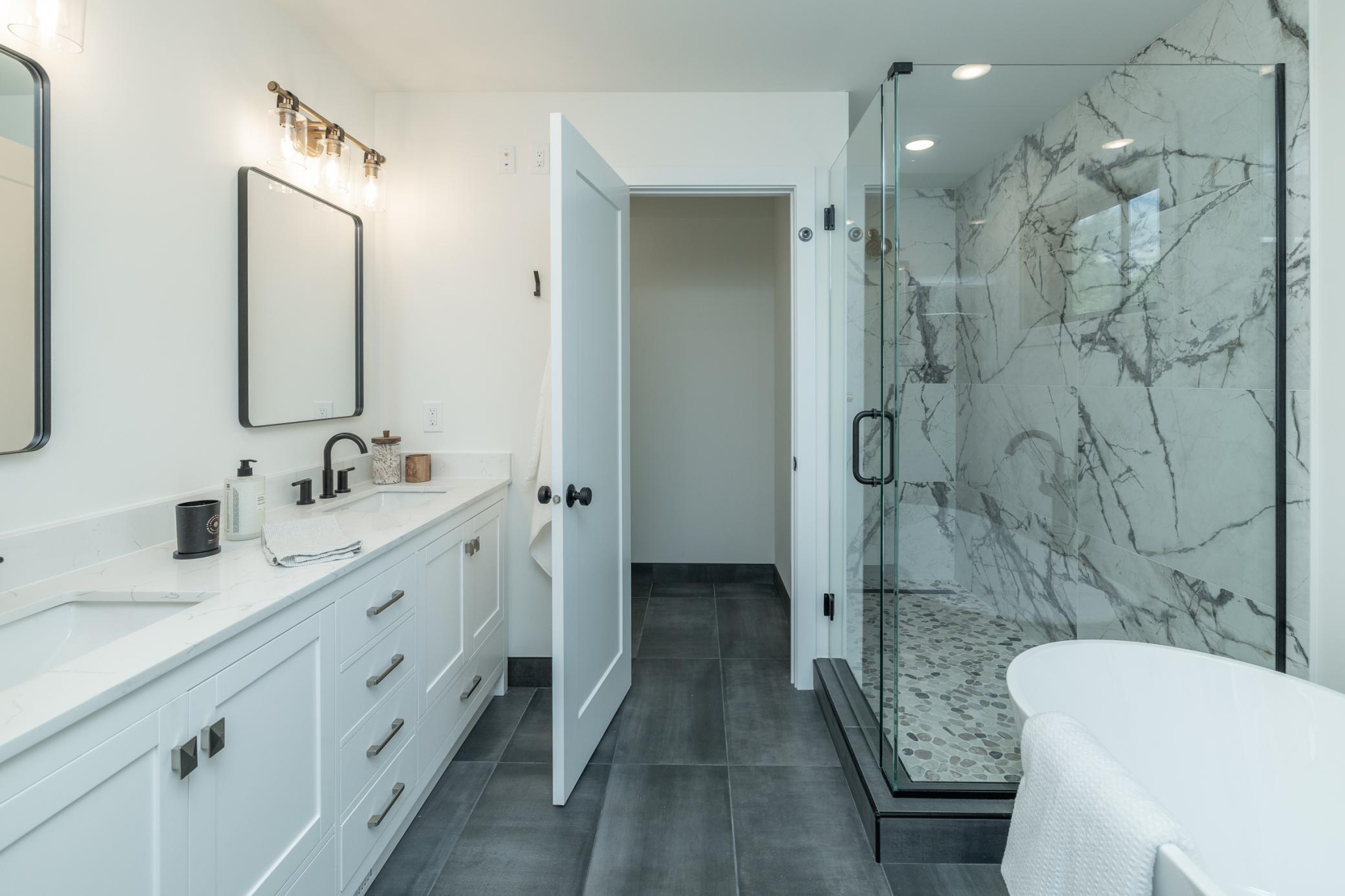 Private primary ensuite with separate shower and tub