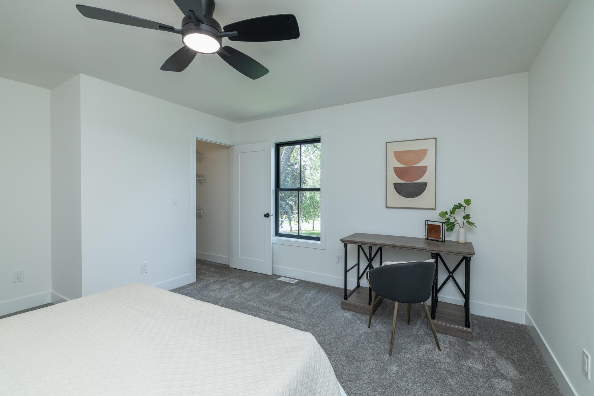 Spacious bedroom with room for desk or work area