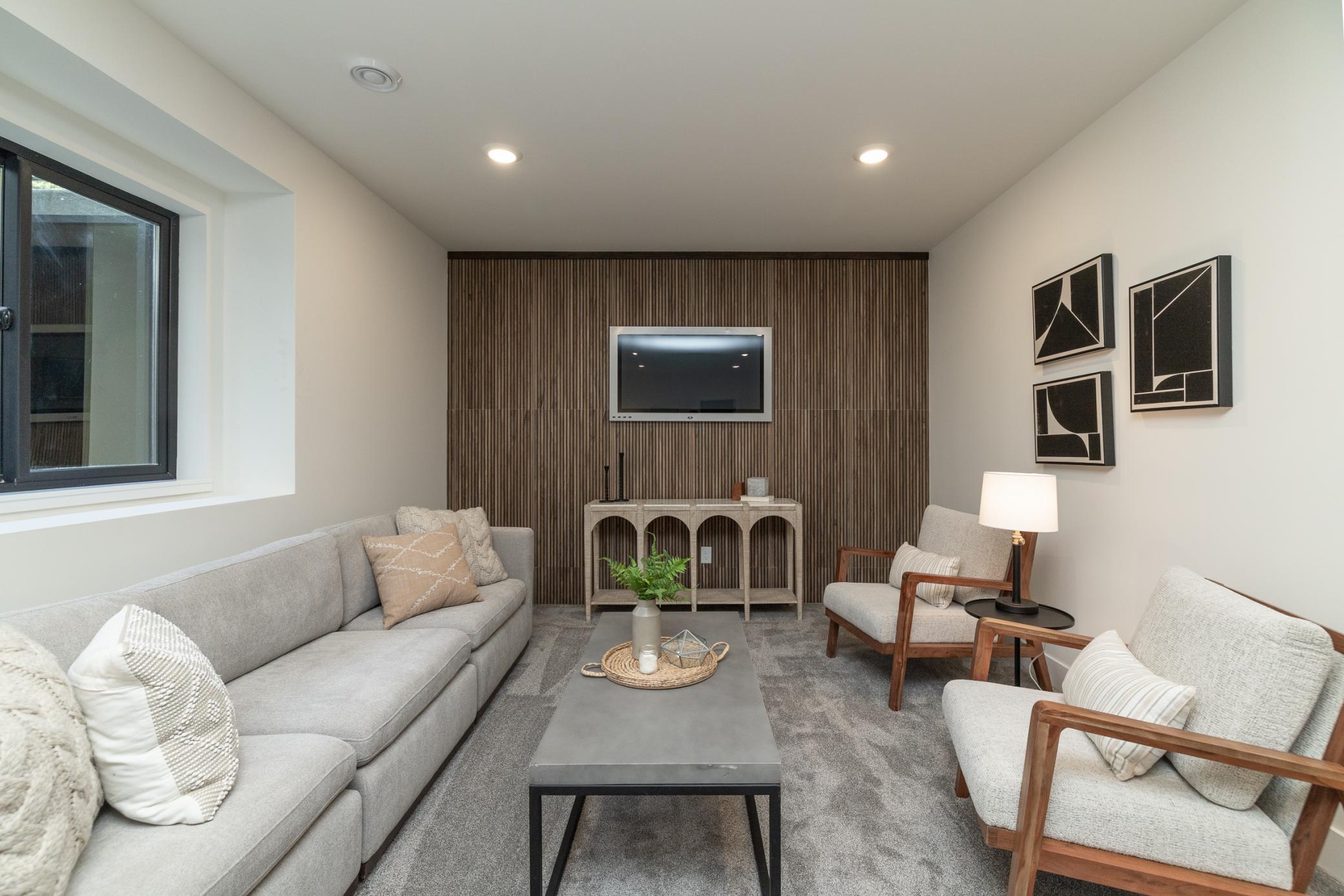 Beautiful family room with custom ceramic wall