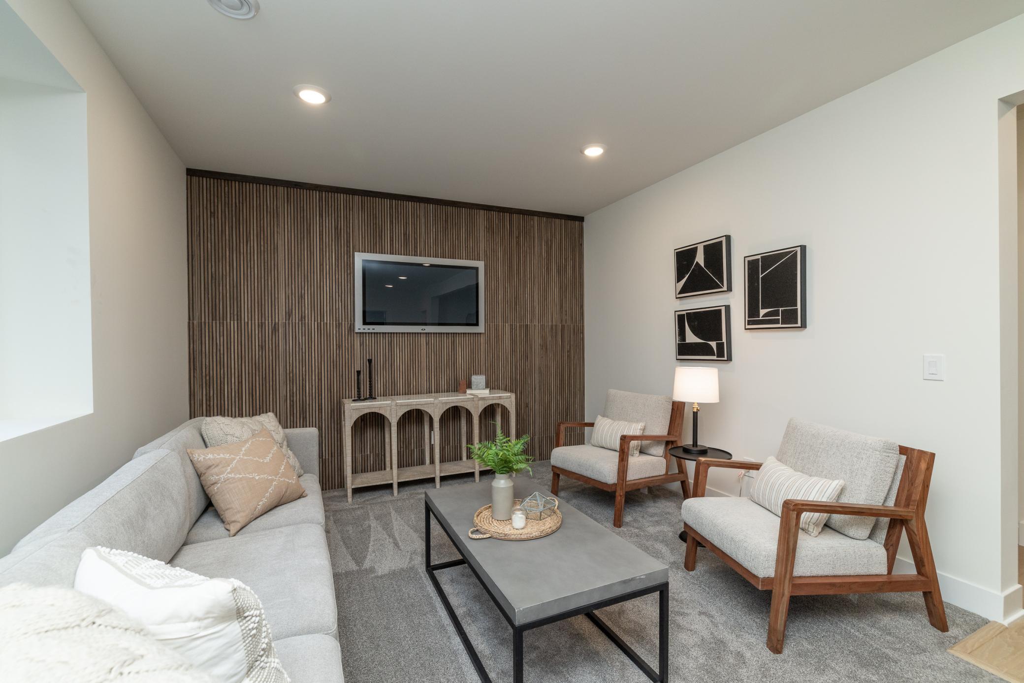 Recessed lights, built in speaker system and neutral colors