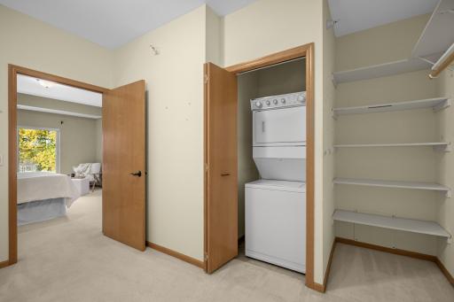Convenient in-unit laundry located in the walk-in closet