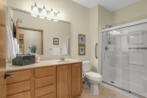 The bathroom offers a convenient, updated walk-in shower.