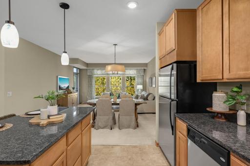 Kitchen is open to the dining and living rooms.
