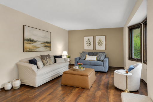 Plenty of room to gather! The generous main-level living space offers flexibility for everyday living and entertaining.