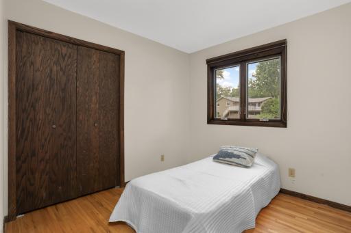 The third main-level bedroom offers flexibility for guests, a home office, hobby space or everyday bedroom use.