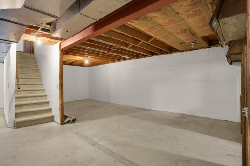So much potential! The expansive unfinished lower level offers a blank canvas ready to create additional living space tailored to your needs.