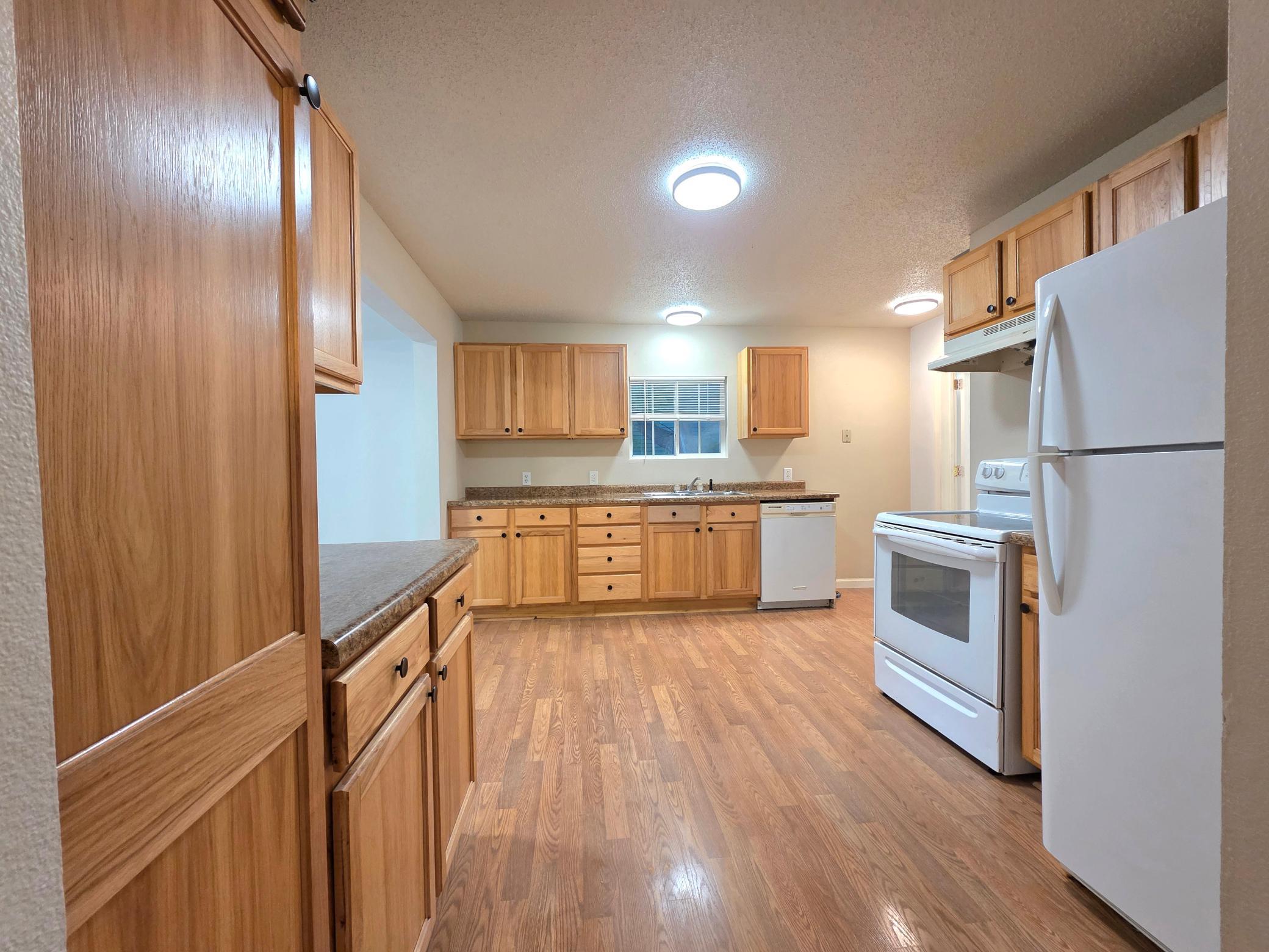 many cabinets and counter space