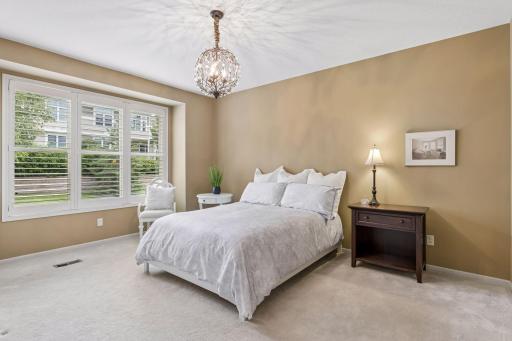 Retreat to the main floor primary suite.