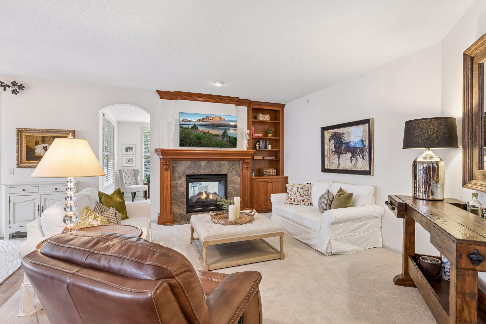 Gas fireplace and custom built-ins are the focal point of the main level living room.