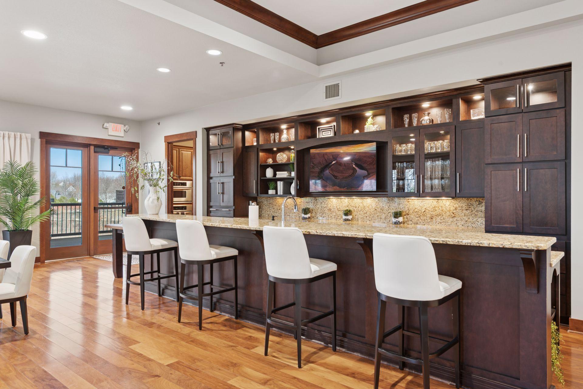 Fully equipped community center offers a lovely bar space.