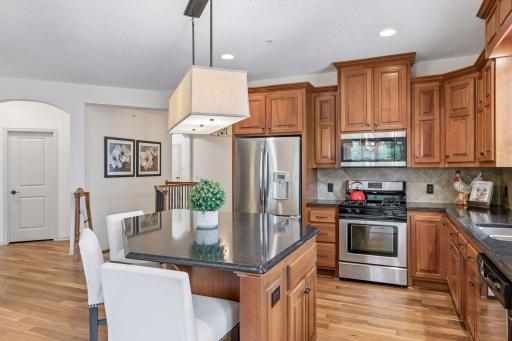 The chefs kitchen features generous space to flow through while you cook! With ample countertop and storage space.