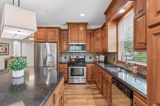 Stainless appliances including a gas range.