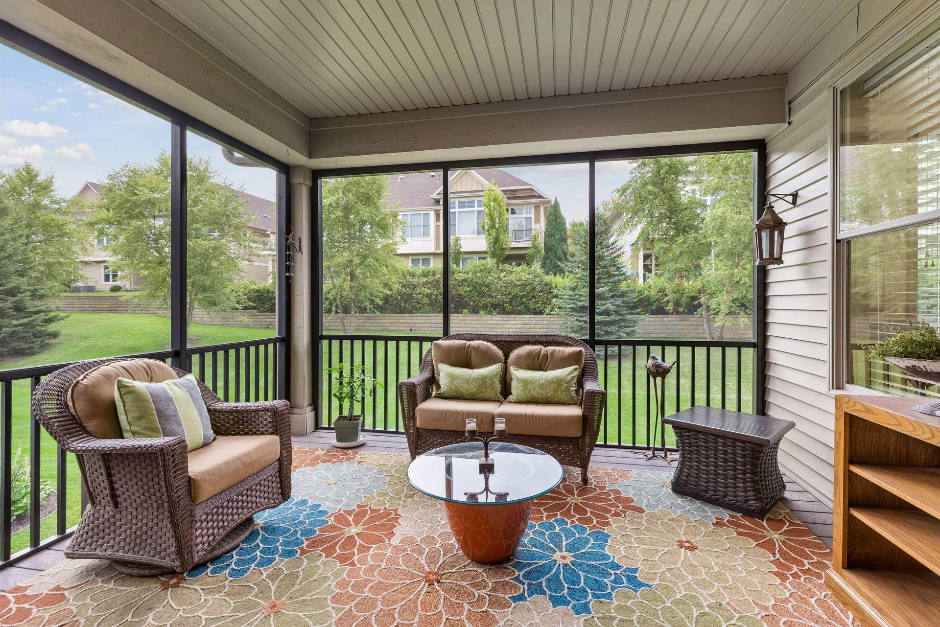 Screened porch with maintenance free decking. What a perfect spot to enjoy your favorite book!