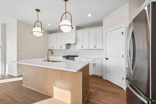 Large island in the kitchen for all family to gather.
