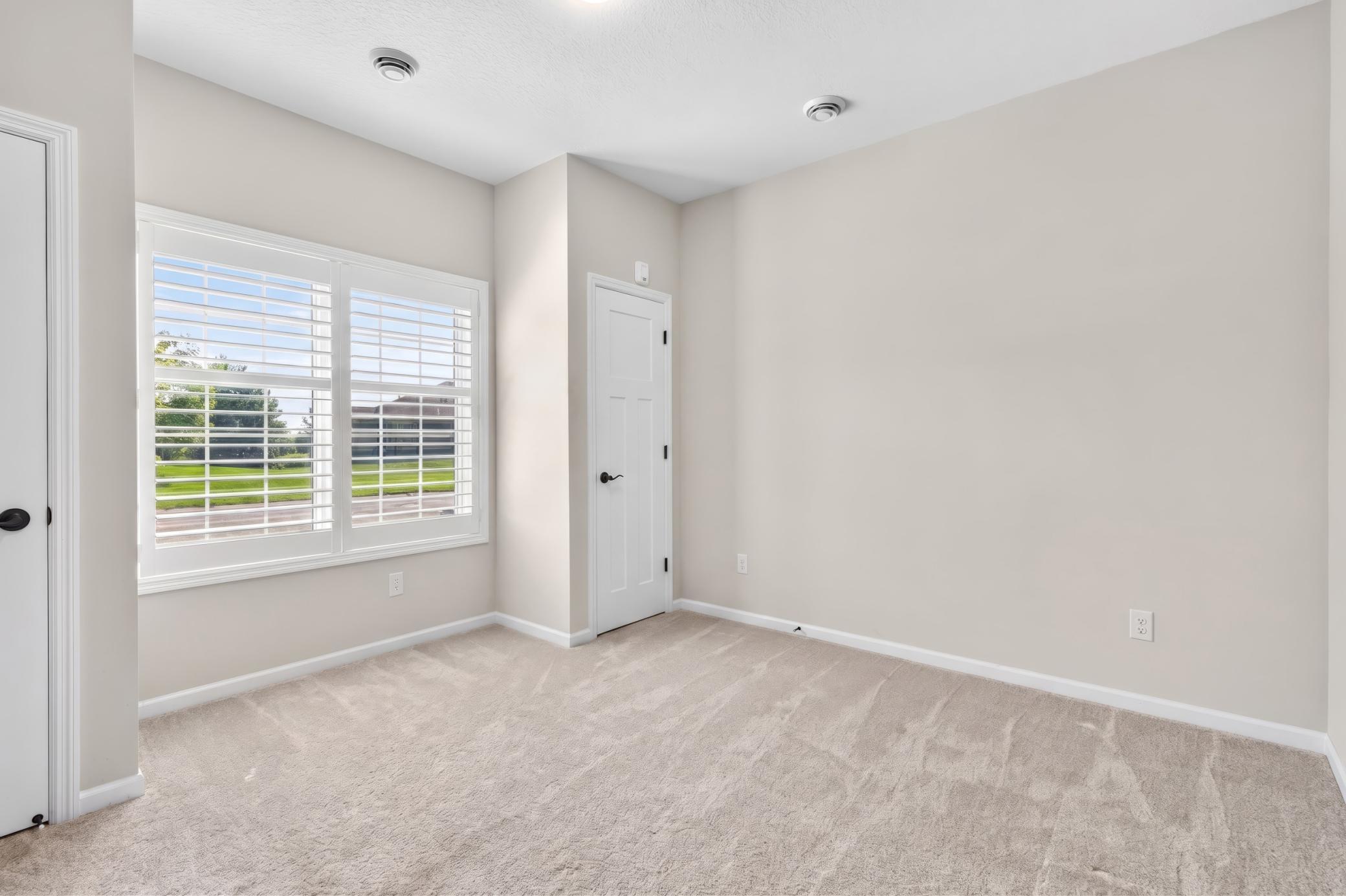 2nd Bedroom with His/Her Closets