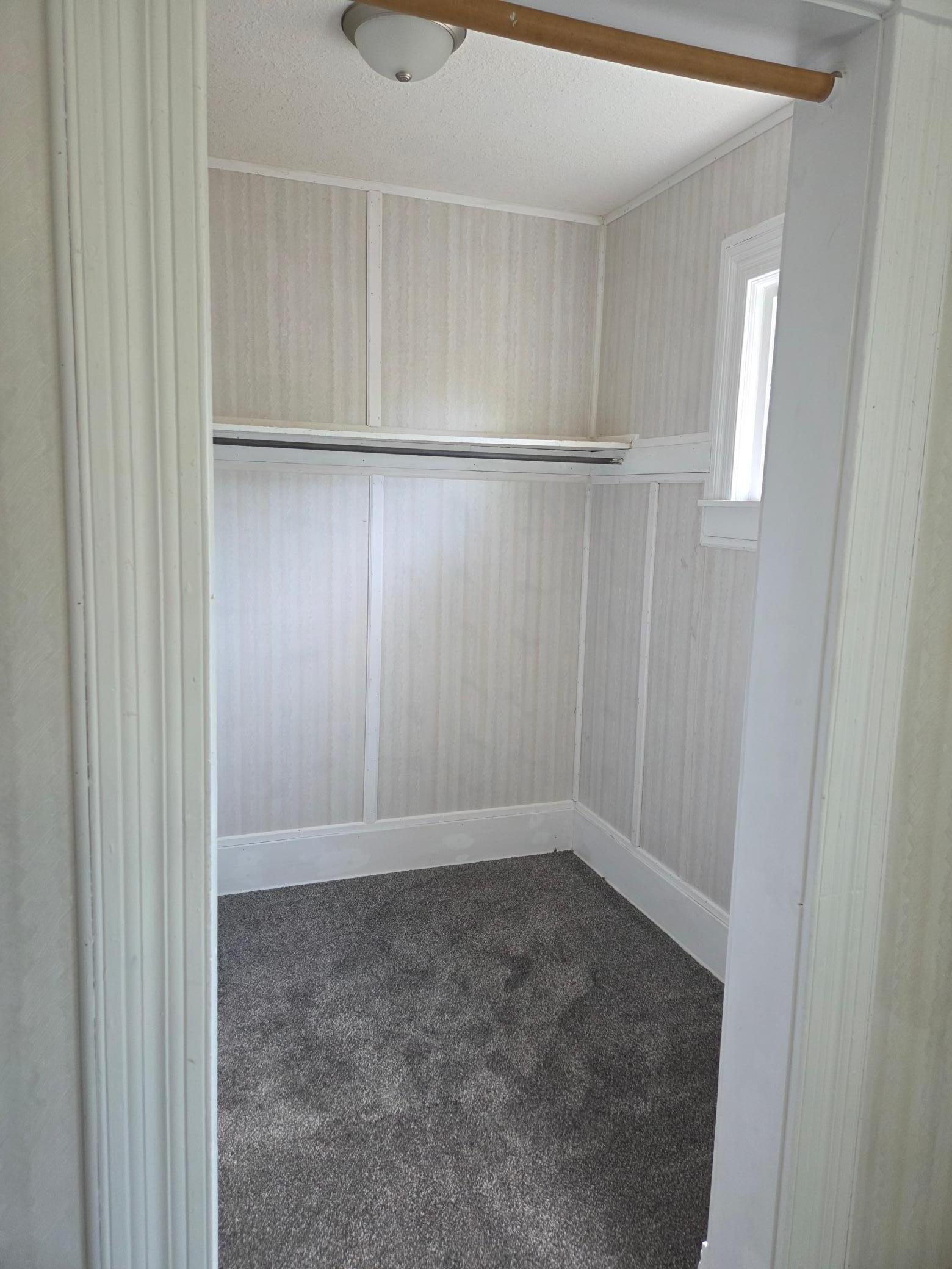 dressing room connected to primary bedroom