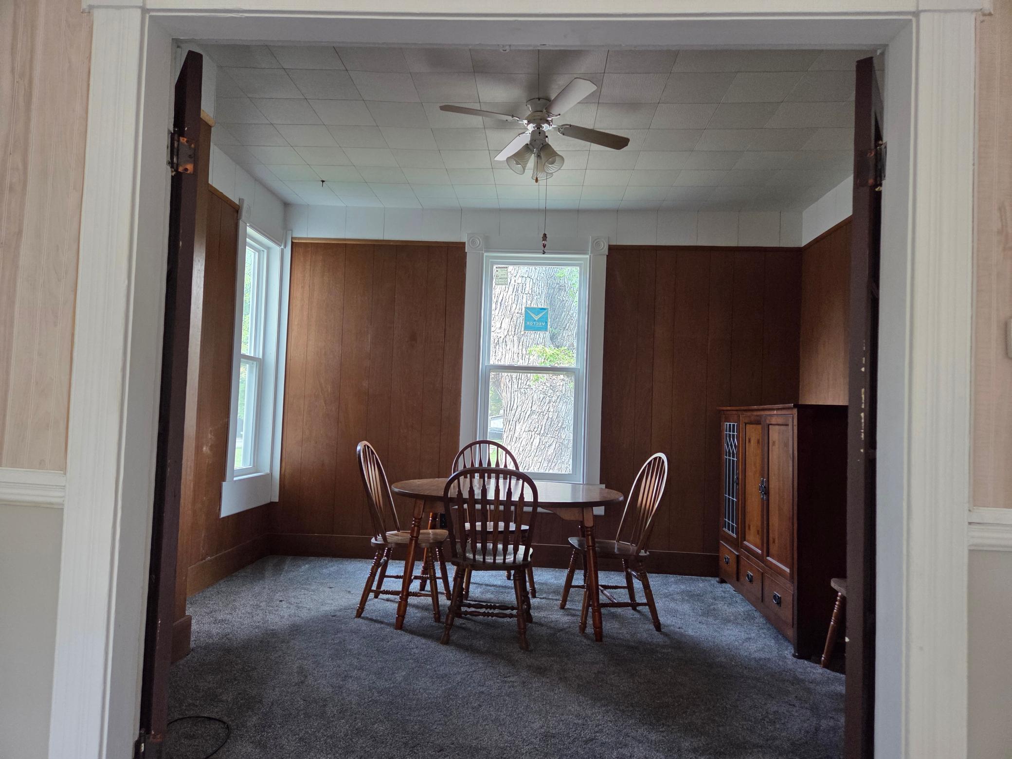 den off formal dining room with ceiling fan