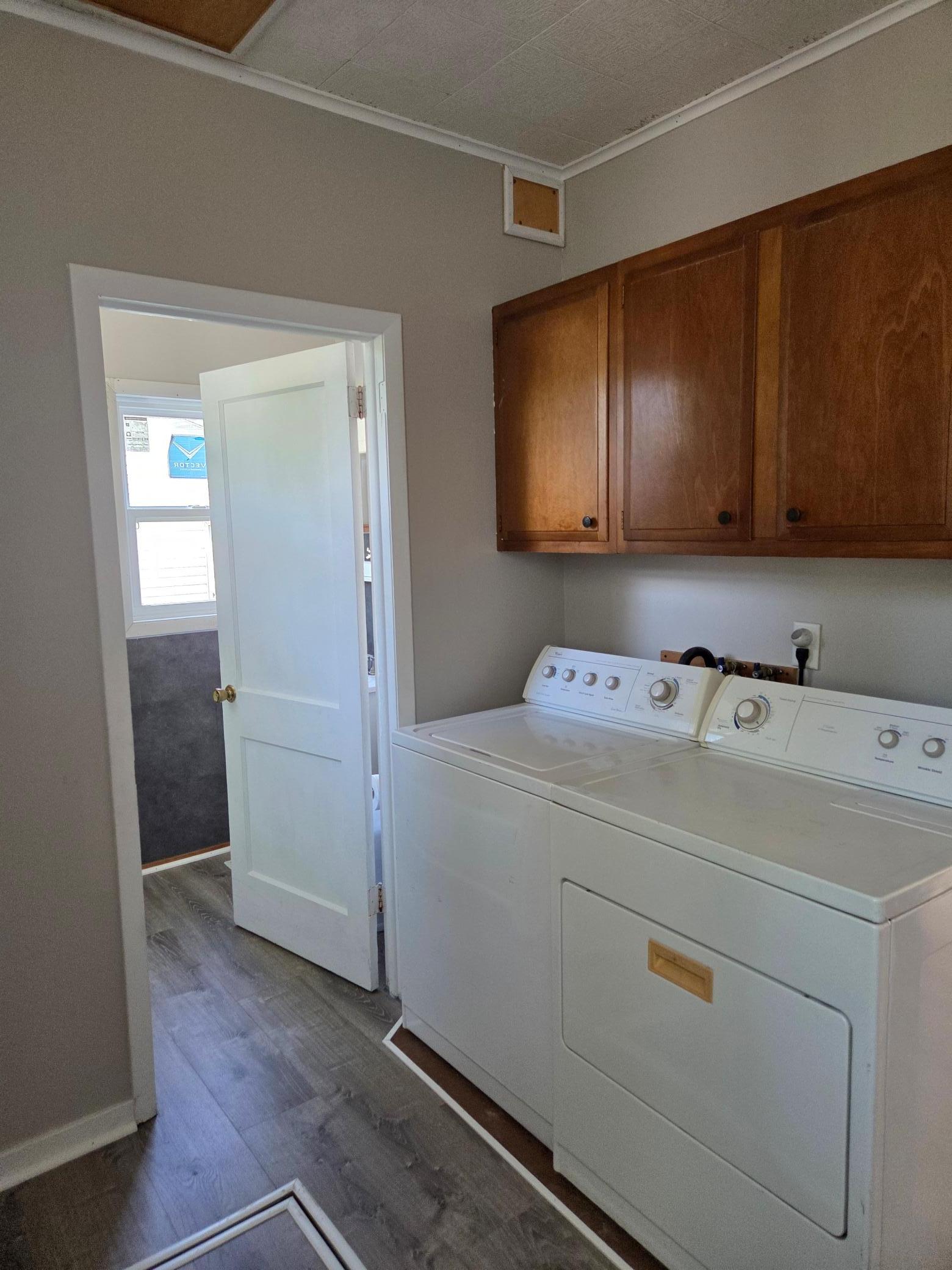 main floor laundry with washer and dryer