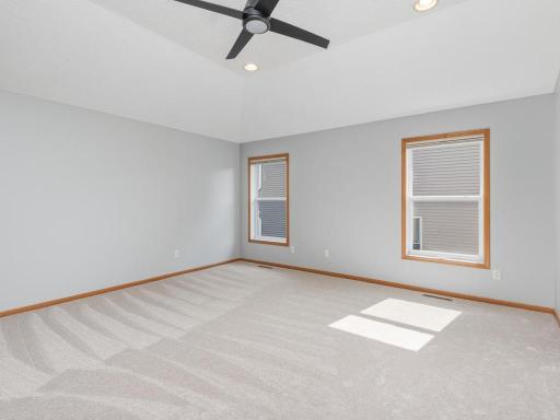 An impressive primary ensuite with vaulted ceilings & abundant space!
