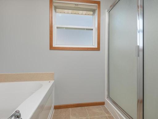 Generous primary bath is a welcoming retreat.