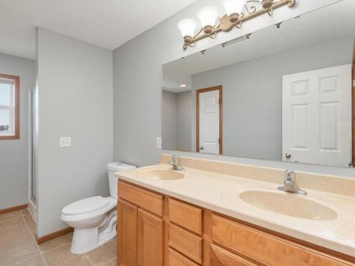 Primary bath with double vanity.