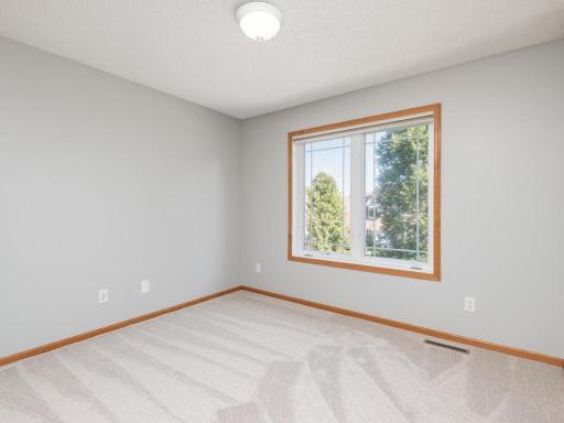 Third of the additional three junior bedrooms on the upper level.