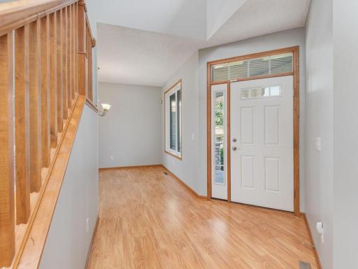 The vaulted entryway is welcoming & bright.