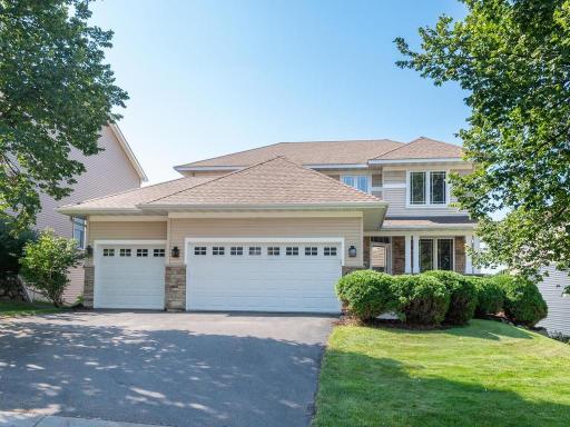 Welcome home to 1511 Pembroke Pass, a fabulous two story in the Preserve at Bluff Creek, a beautiful neighborhood nestled in the heart of Chanhassen.