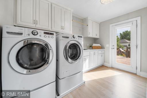 Main level laundry room with direct access to outdoor pool area