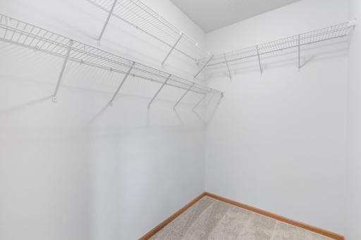 Generous sized walk-in closet located in the primary bedroom.