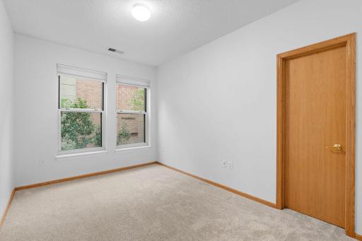 The second bedroom also includes a walk-in closet. This room could also be a great home office space.