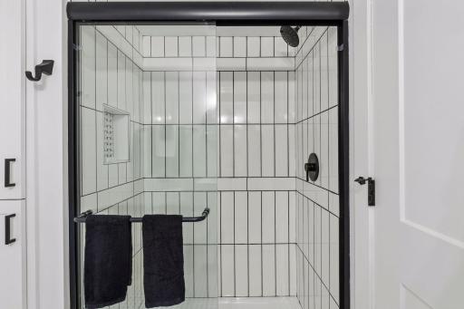 with amazing new shower - nod to the mid-century style with the tile design