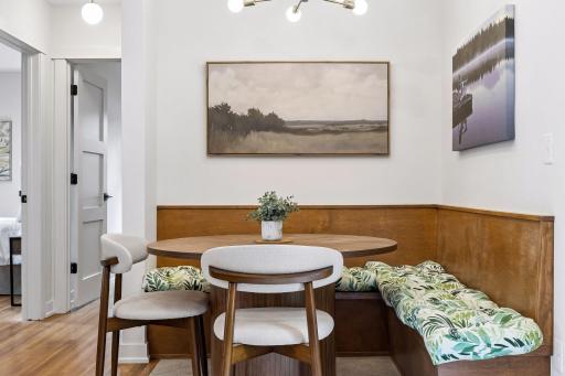 A new, open floor plan made room for a proper dining nook with custom built-in banquette