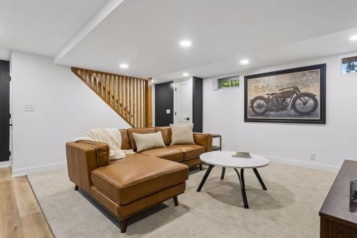 Great family room and great details like the custom stair wall - it's the details that make a home