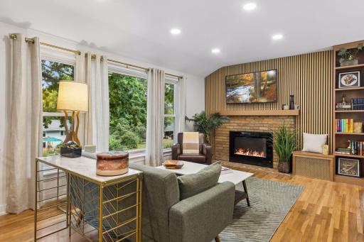large Sochacki Park facing living room windows bring light in to your newly refreshed and updated home