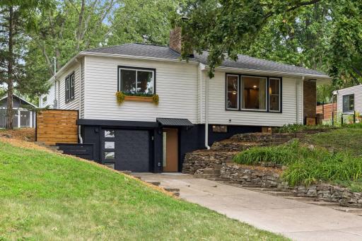 Welcome to 3037 Kyle Ave N - a 1950s mid-century rambler with plenty of updates and surprises you're sure to love