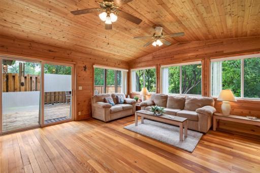 Four season porch opens up to a private deck space.