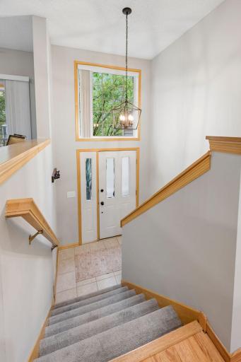 Welcoming split-level entry with a large window providing abundant natural light.