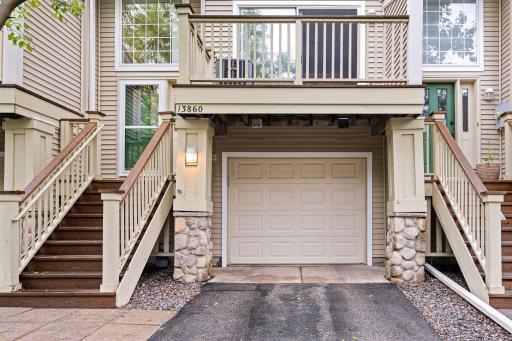 Private attached 2 car tandem garage with driveway parking and convenient access to the home